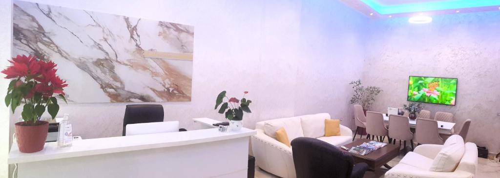 TV a/nebo společenská místnost v ubytování Comfort Hotel