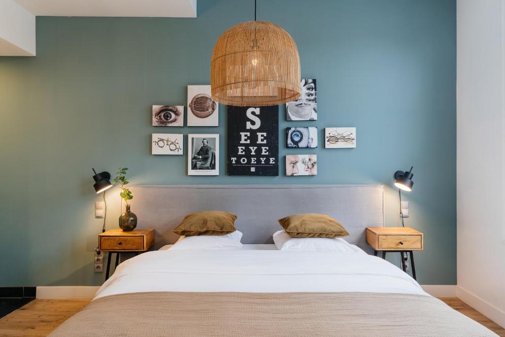 Postel nebo postele na pokoji v ubytování Eye Hotel