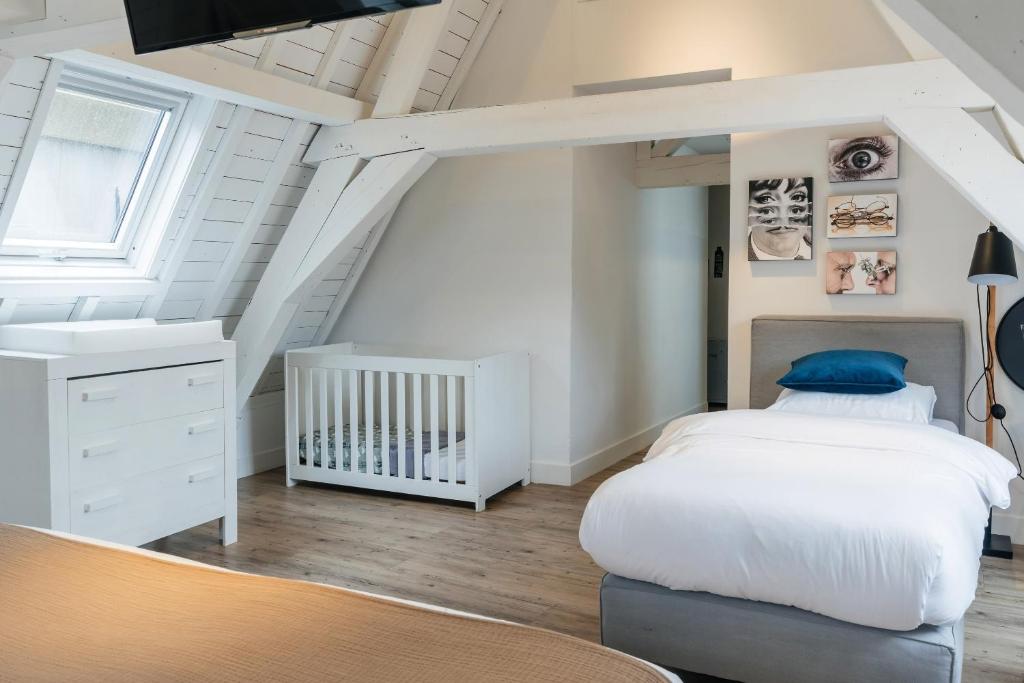 Postel nebo postele na pokoji v ubytování Eye Hotel