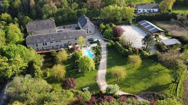 an aerial view of a large house with a yard at Au bout de mes rêves in Walcourt