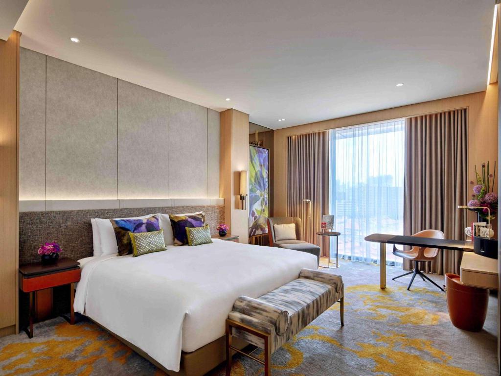 Sofitel Singapore City Centre客房内的一张或多张床位