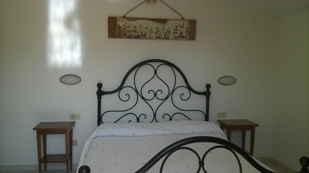 Postel nebo postele na pokoji v ubytování Agriturismo La Cantina VIA CAMPIGLIONE DI ASSISI