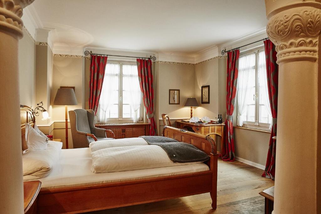 Postel nebo postele na pokoji v ubytování Hotel Gutsgasthof Stangl