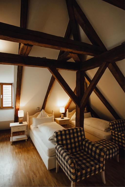 Postel nebo postele na pokoji v ubytování Hotel "Alter Pfarrhof"