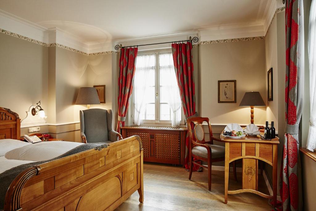 Postel nebo postele na pokoji v ubytování Hotel Gutsgasthof Stangl