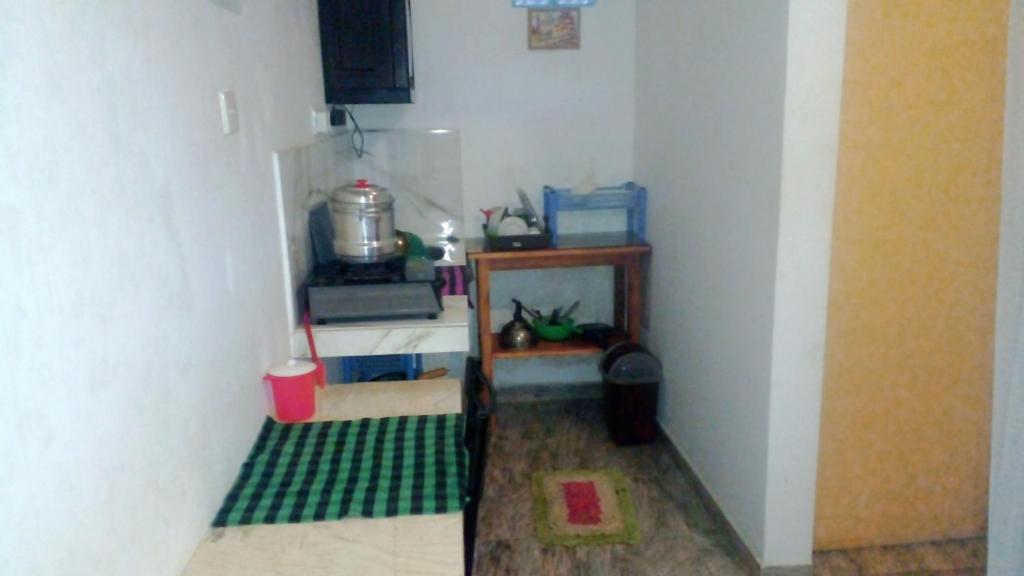 Kuchyň nebo kuchyňský kout v ubytování Jayanika home stay