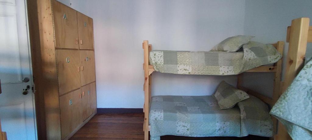Letto o letti in una camera di Scorpius Hostel