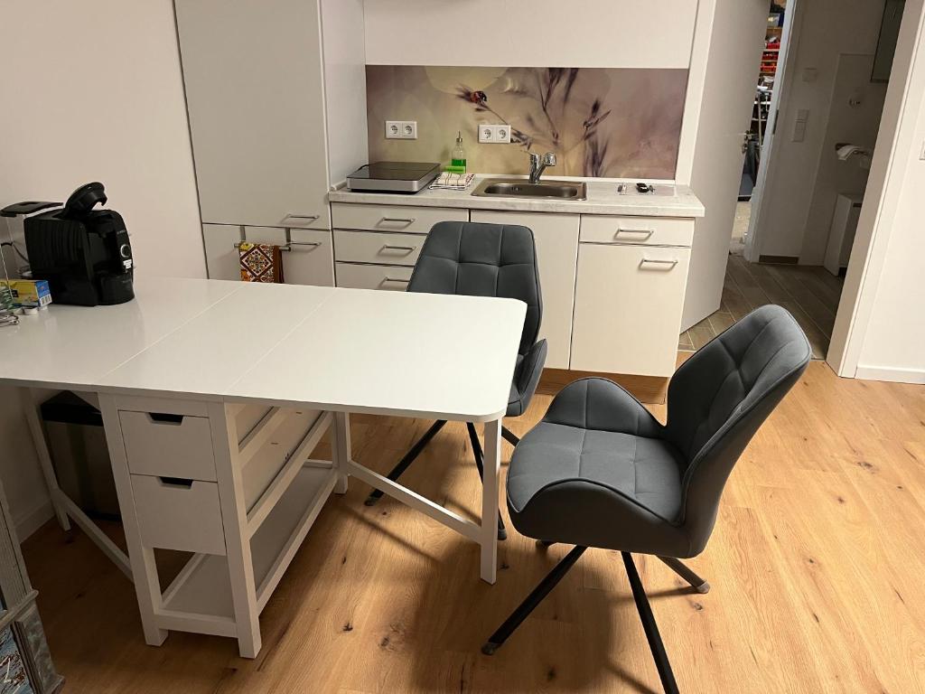 Kuchyň nebo kuchyňský kout v ubytování Gemütliches Eifeler Gästehäuschen