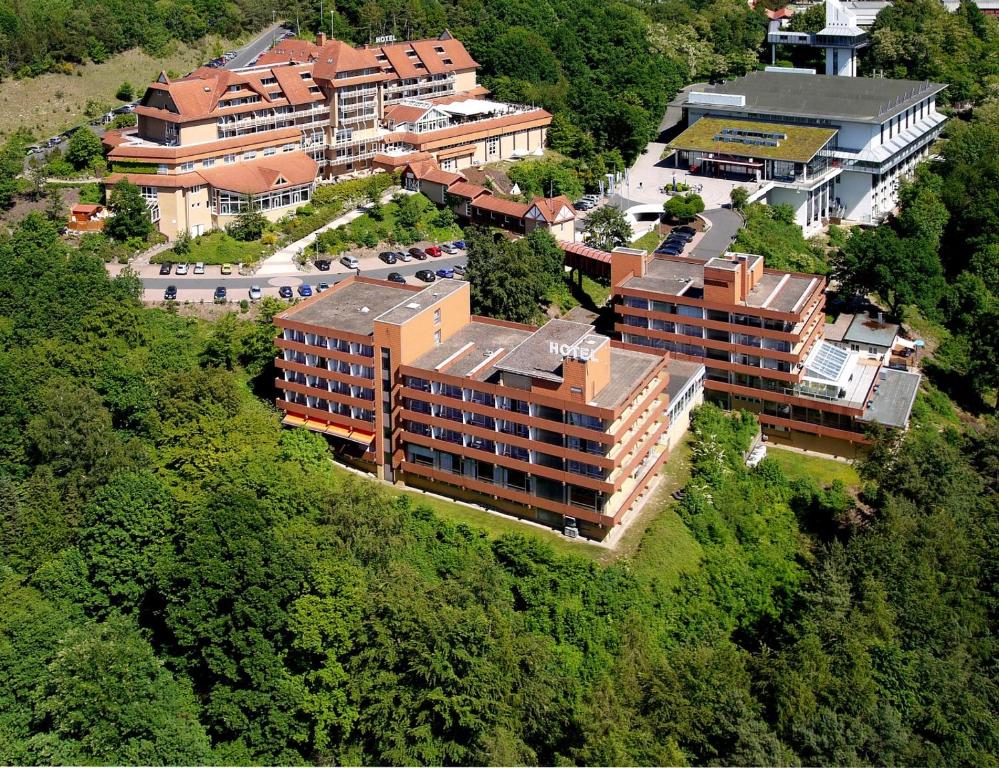 an overhead view of a group of buildings on a hill at Hotel Pergola im Göbels Hotel Rodenberg in Rotenburg an der Fulda
