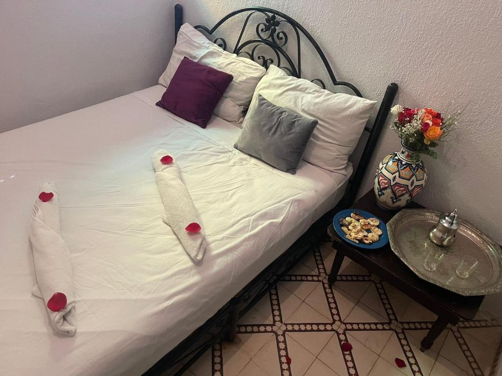 Postel nebo postele na pokoji v ubytování HOTEL EL AMAL