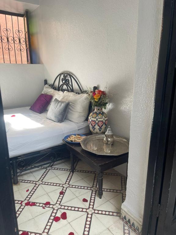 Postel nebo postele na pokoji v ubytování HOTEL EL AMAL