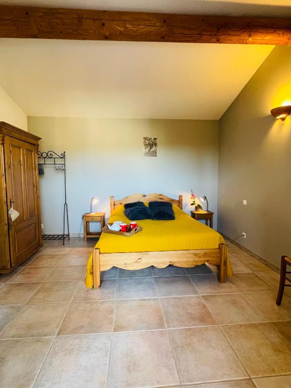 Postel nebo postele na pokoji v ubytování Gîte Les Vignes