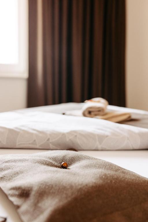 Katil atau katil-katil dalam bilik di Hotel Murat