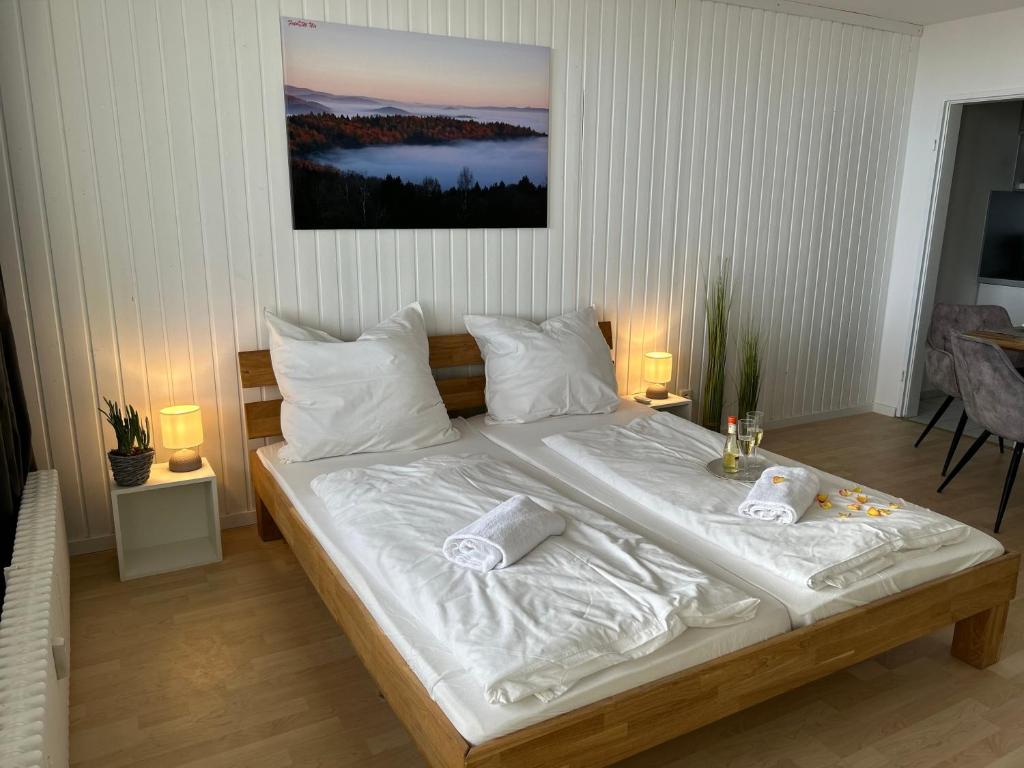 Postel nebo postele na pokoji v ubytování Ferienwohnung Uns Uwe