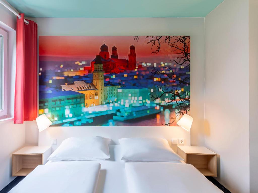 Postel nebo postele na pokoji v ubytování B&B Hotel Passau