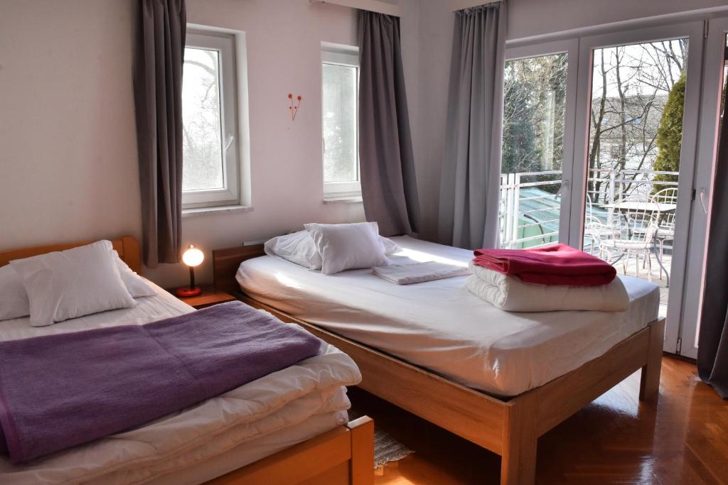 Ένα ή περισσότερα κρεβάτια σε δωμάτιο στο Deluxe Trsje Apartments