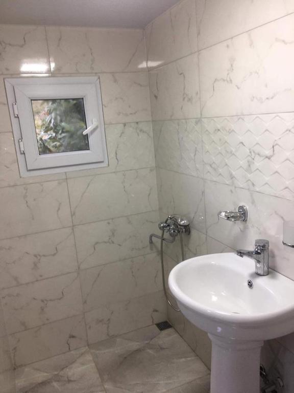 Koupelna v ubytování Guesthouse Tornike