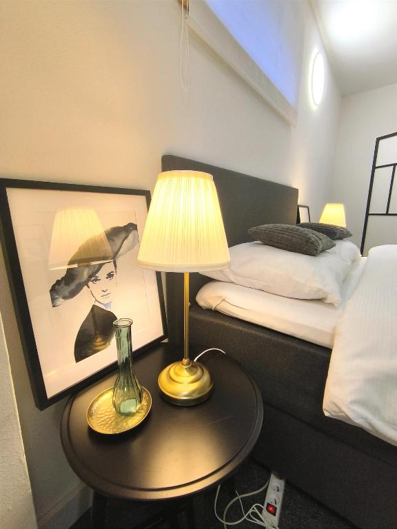 A bed or beds in a room at Park Bôrik 4YOU & Free Parking
