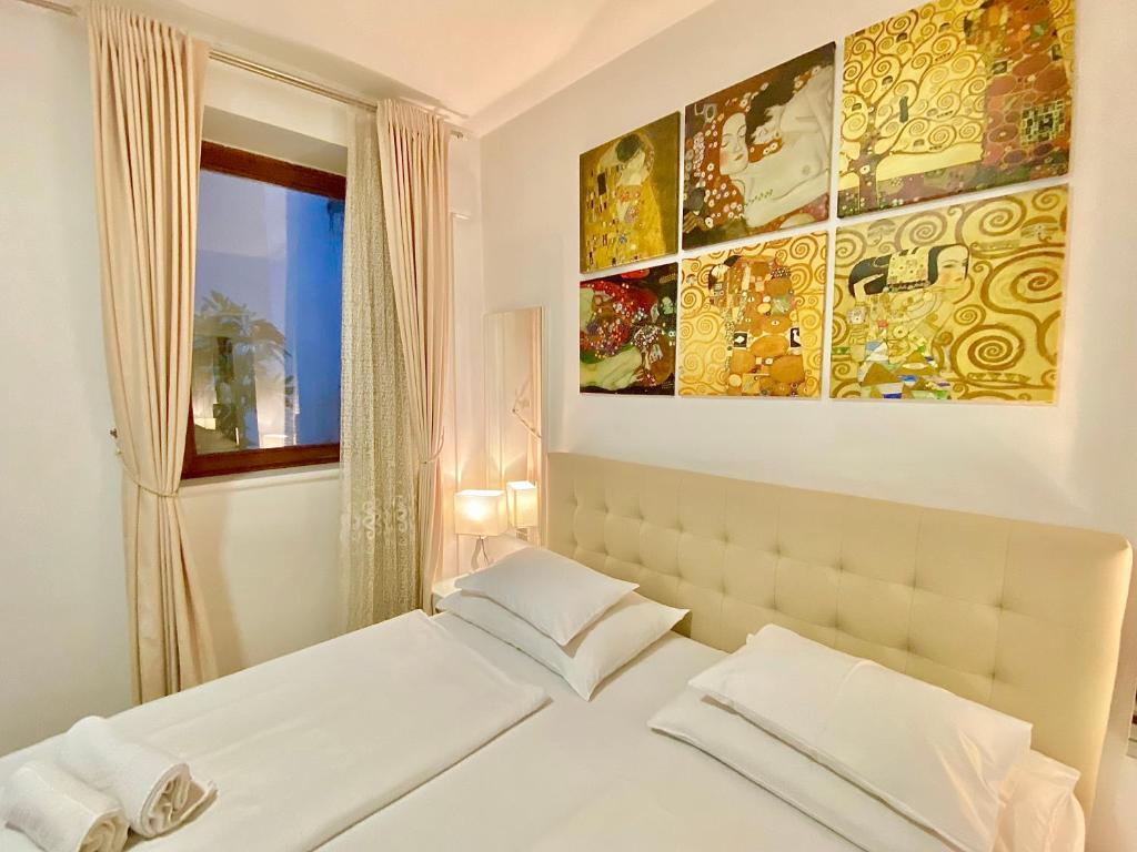Letto o letti in una camera di Steiner Residences Vienna Augarten