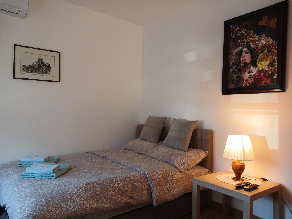 Postel nebo postele na pokoji v ubytování Deluxe studio & apartments Alexander