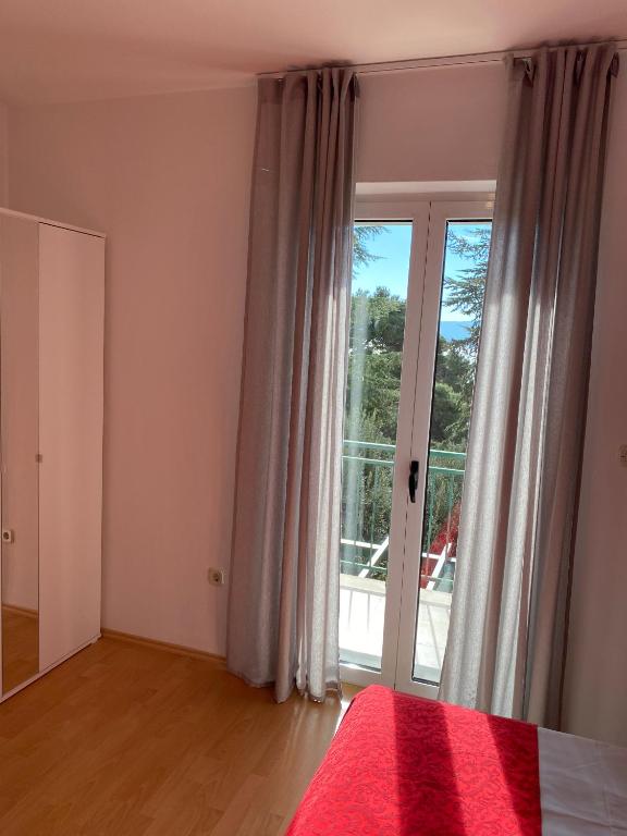 Postel nebo postele na pokoji v ubytování Villa Jasmin 1