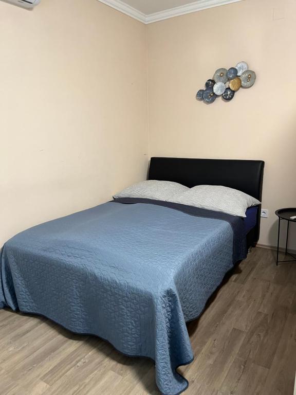 Postel nebo postele na pokoji v ubytování Kelemen Apartman Nagykanizsa