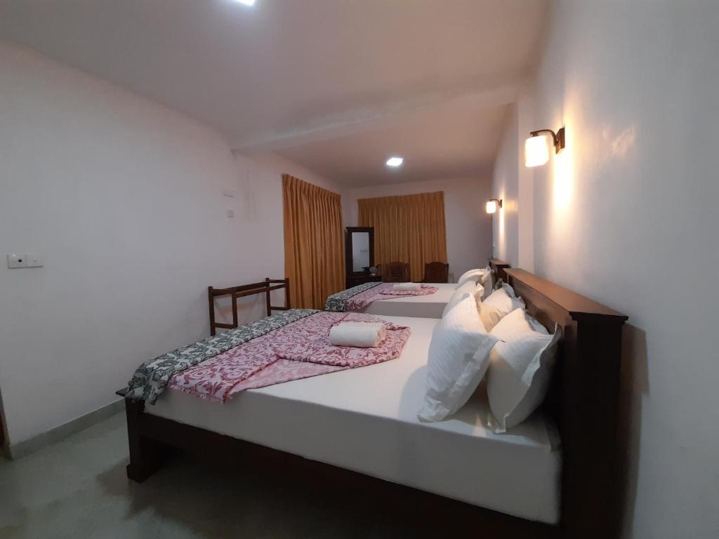 Postel nebo postele na pokoji v ubytování Amaya View Guest Inn