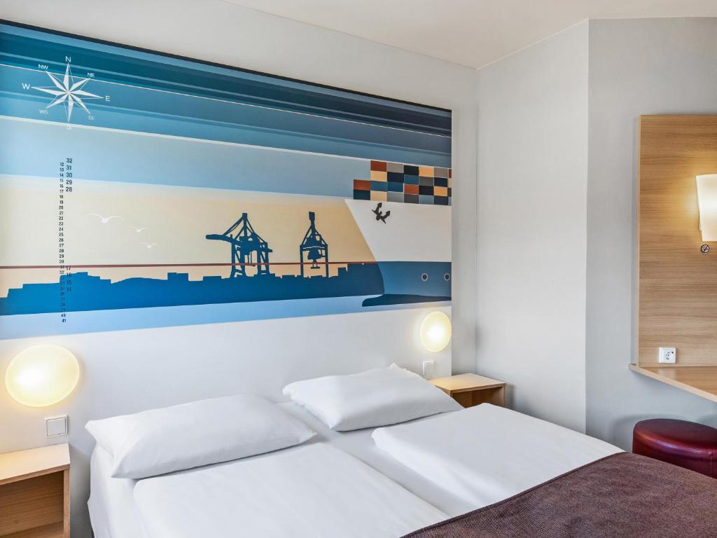 Postel nebo postele na pokoji v ubytování B&B Hotel Hamburg-Altona