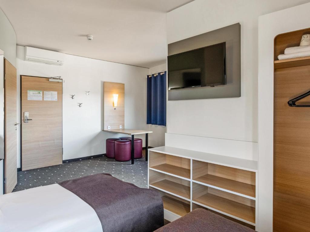 Postel nebo postele na pokoji v ubytování B&B Hotel Hamburg-Altona