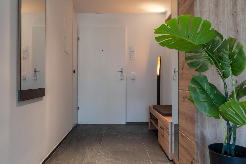 TV a/nebo společenská místnost v ubytování Charmante Wohnung mit Balkon nahe Thunersee - Bitcoin accepted