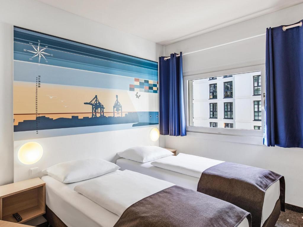 Postel nebo postele na pokoji v ubytování B&B Hotel Hamburg-Altona
