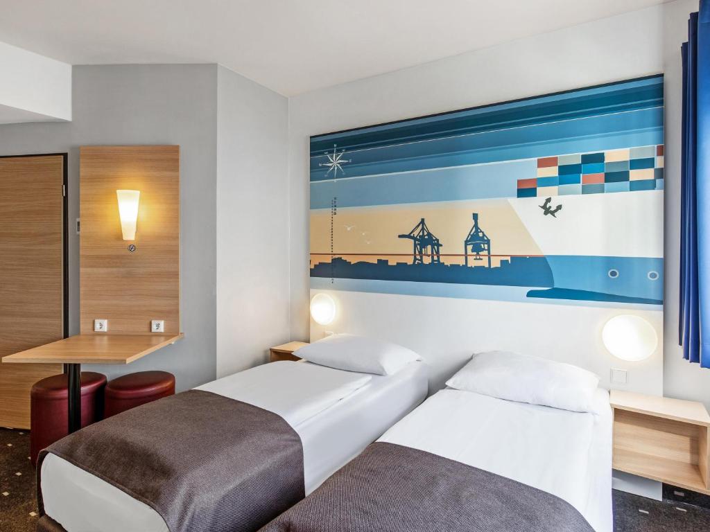 Postel nebo postele na pokoji v ubytování B&B Hotel Hamburg-Altona