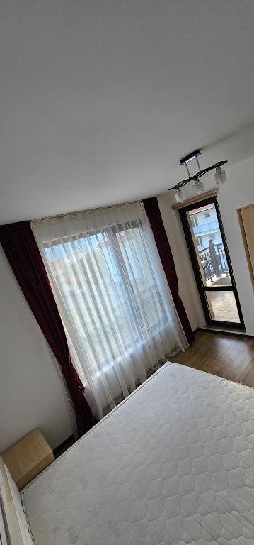 Postel nebo postele na pokoji v ubytování Sea View apartment, Morsky Bryag