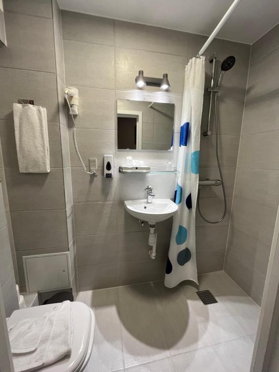 Koupelna v ubytování Hotel Skandia