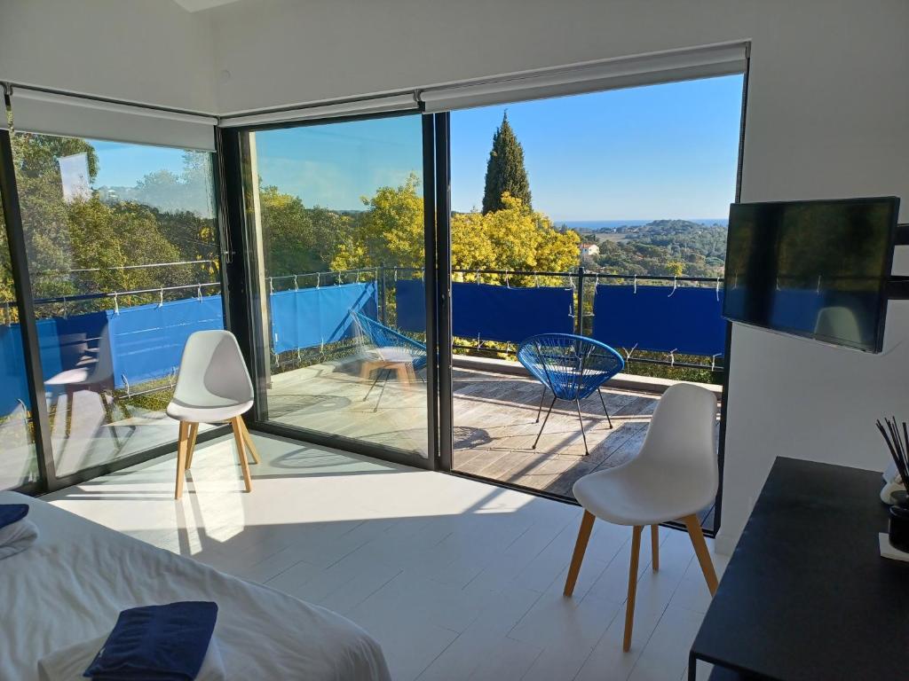 Balkon lub taras w obiekcie Magnifique villa avec piscine, vue mer