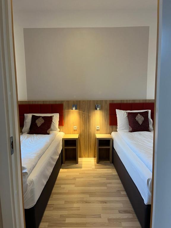 Postel nebo postele na pokoji v ubytování Hotel Skandia