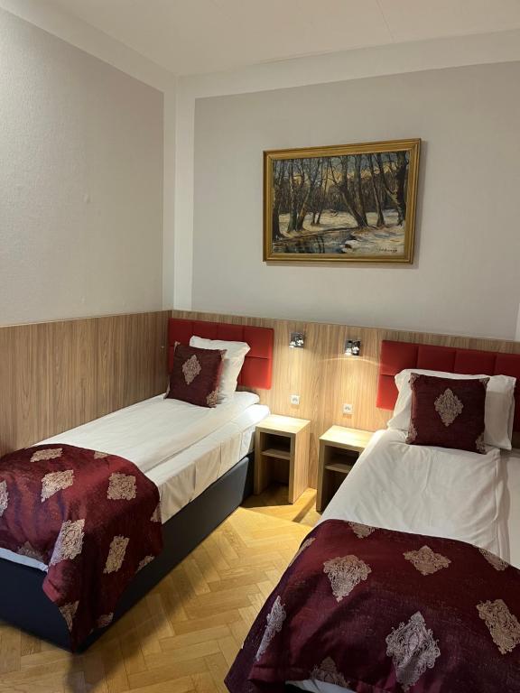 Postel nebo postele na pokoji v ubytování Hotel Skandia