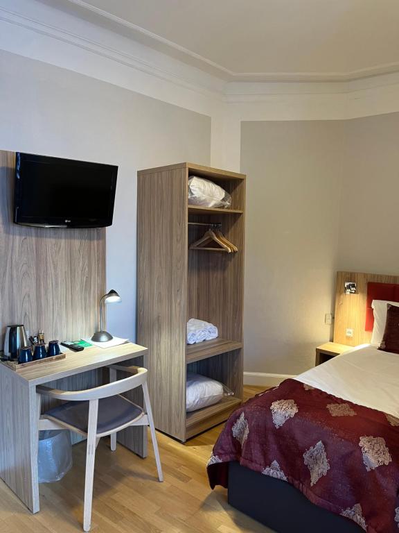 Postel nebo postele na pokoji v ubytování Hotel Skandia
