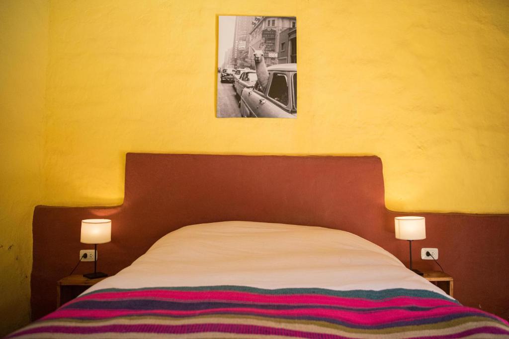 Postel nebo postele na pokoji v ubytování Hostel La Humahuacasa