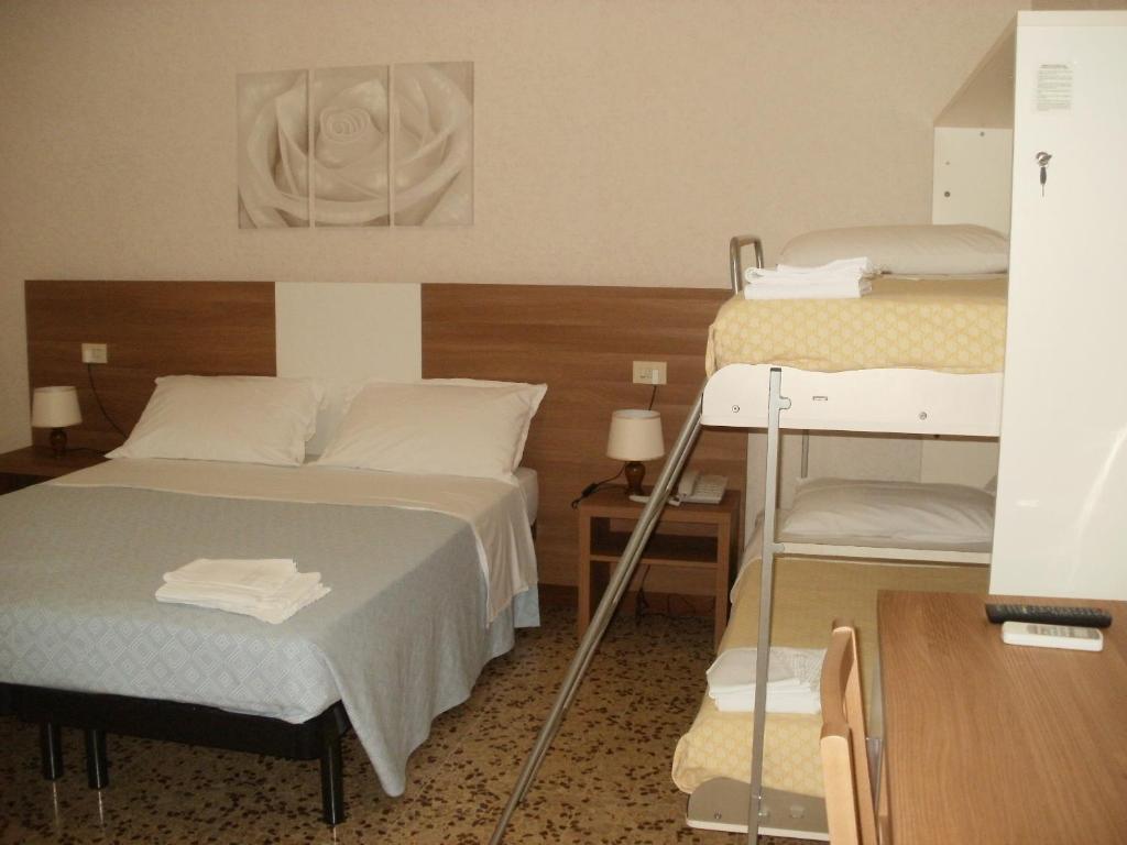 Hotel Mucciolini - Habitación Cuádruple