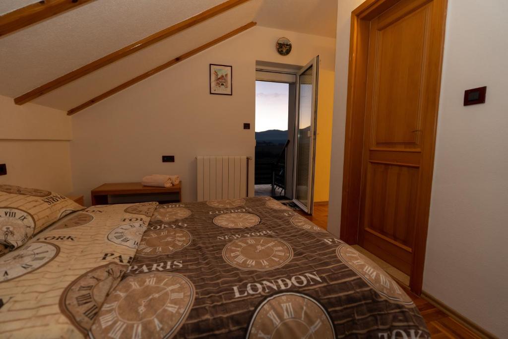 Postel nebo postele na pokoji v ubytování Apartman Miramare