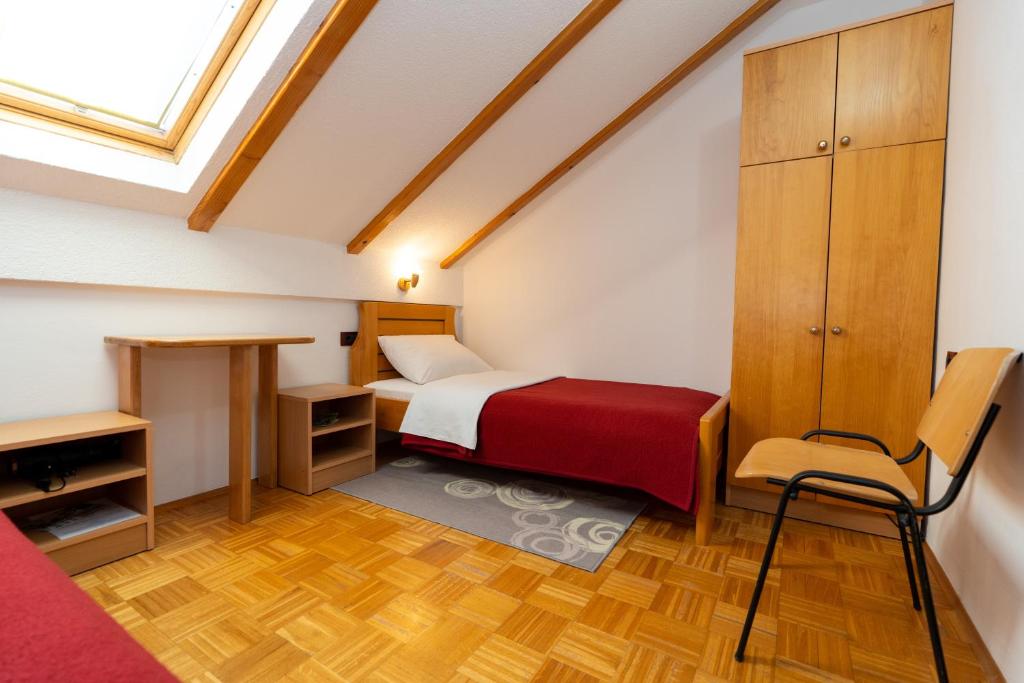 Postel nebo postele na pokoji v ubytování Apartman Miramare