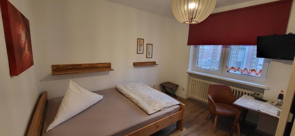 Postel nebo postele na pokoji v ubytování Hotel Zrenners GARNI