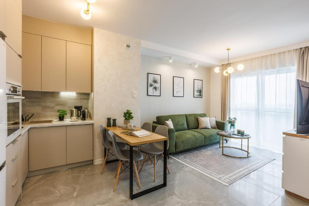 Kuchyň nebo kuchyňský kout v ubytování Emihouse Riverside Apartments