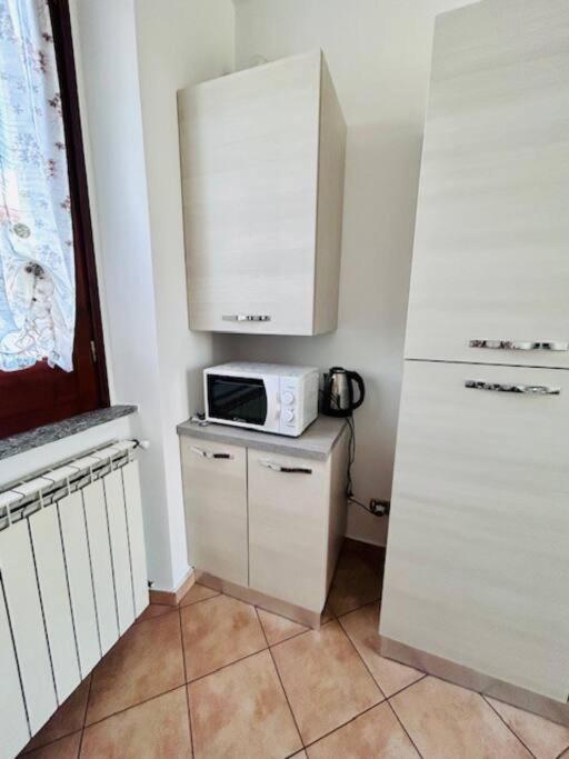 Kuchyň nebo kuchyňský kout v ubytování Casa Lucia a Carugo
