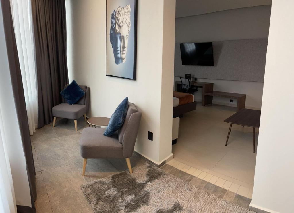 TV a/nebo společenská místnost v ubytování Grand Hotel&Casino Vía Dorada