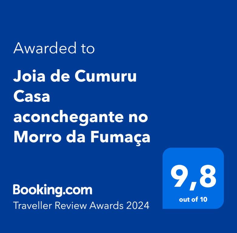 Un certificat, premiu, logo sau alt document afișat la Joia de Cumuru Casa aconchegante no Morro da Fumaça