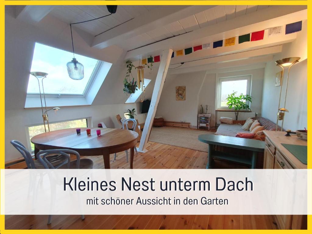 Ruang duduk di Fewo Kleines Nest strandnah optimal für Alleinreisende und Paare mit Haustier