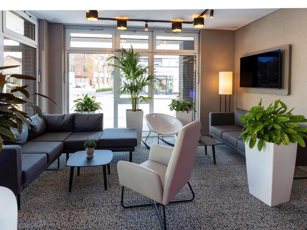 TV a/nebo společenská místnost v ubytování B&B HOTEL Bad Hersfeld