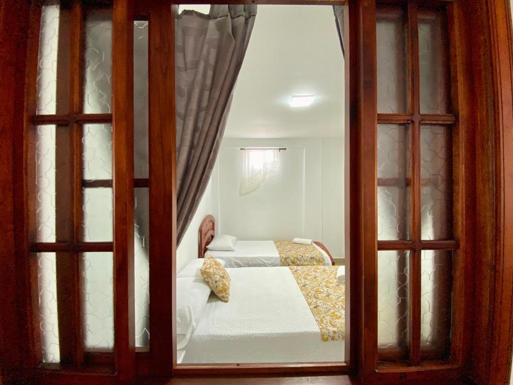 Postel nebo postele na pokoji v ubytování Casa Lubel